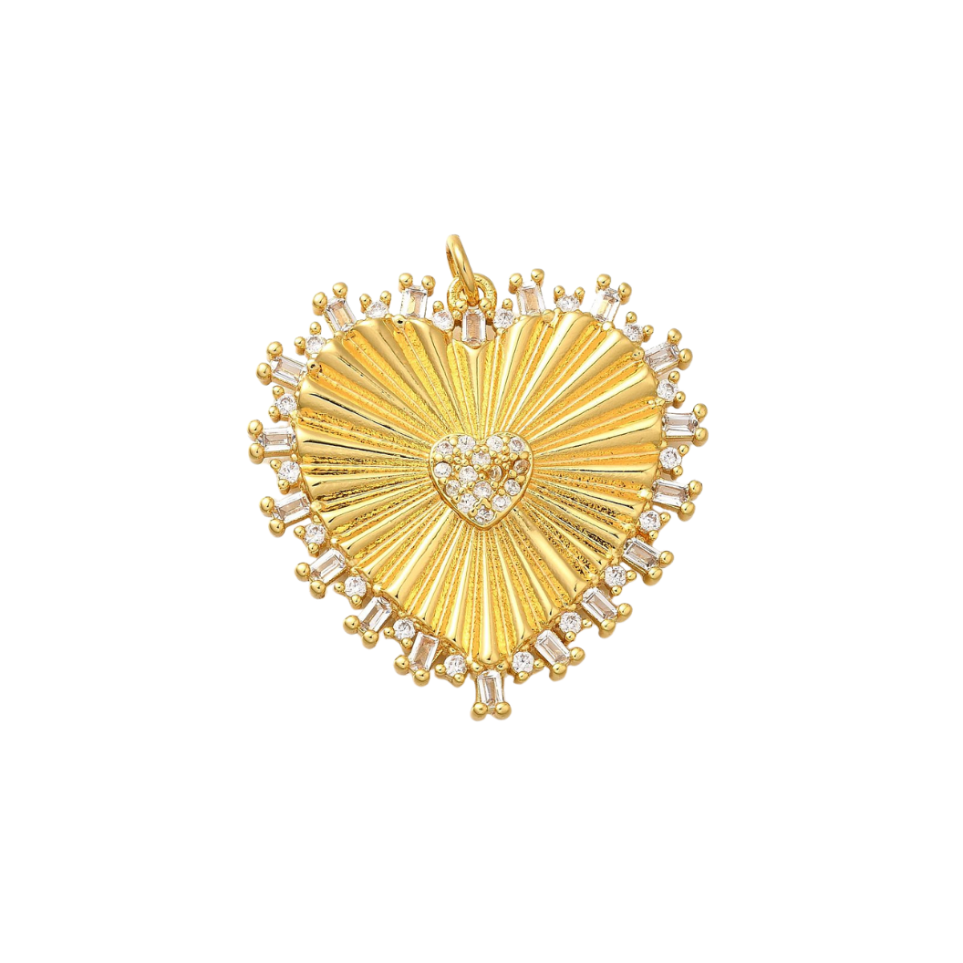 A gold-plated charm featuring a heart shape with cubic zirconia stones and a golden burst design in the center.