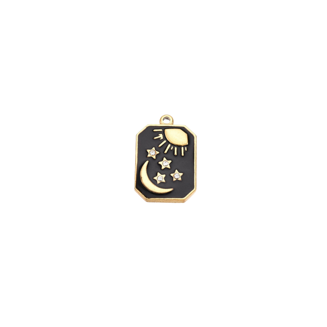 Black and gold pendant with moon and star design on a white background
