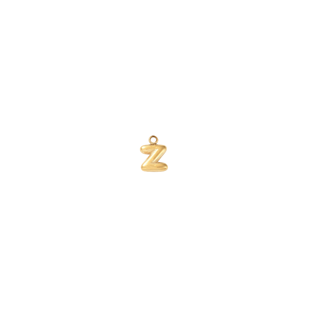 Gold pendant with 'Z' on a white background