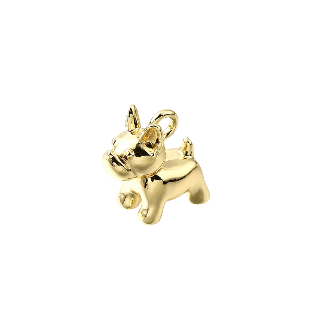 Gold dog-shaped pendant on a white background