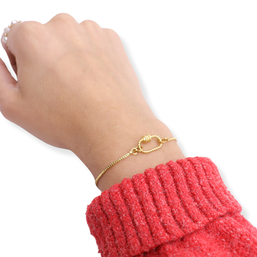 Front of the Gold Bolo Bracelet with Small Bella on wrist