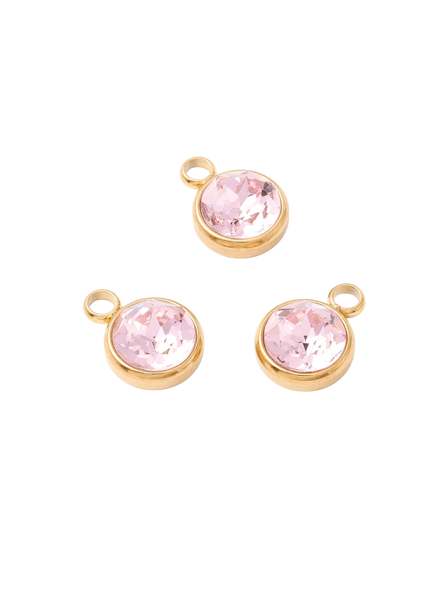 Front view of three Gold Round Assorted Glass Charms