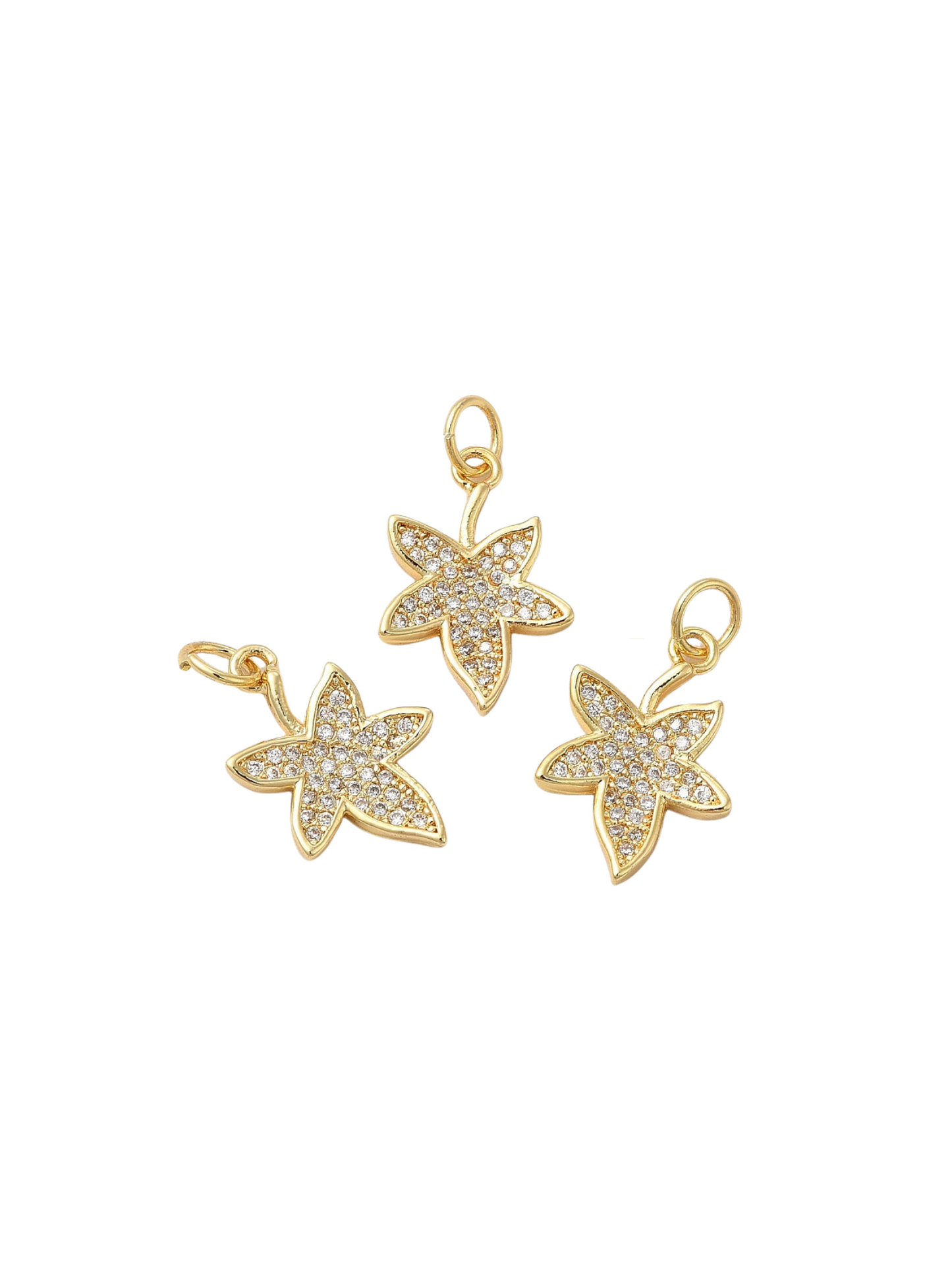 Front of three Gold Inlaid Autumn Leaf Charms