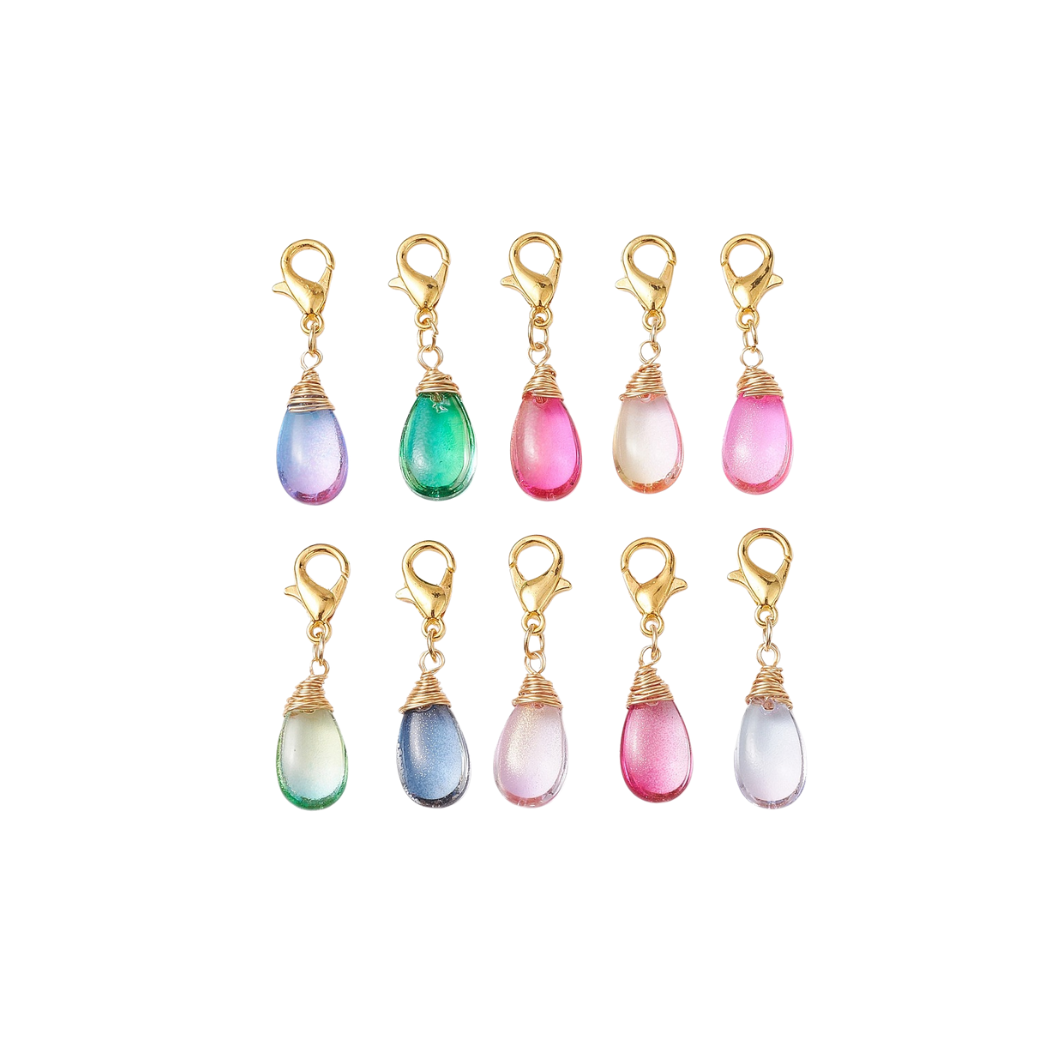 Front of ten Glass Tear Drop Wire wrapped Pendant Shoe Charm