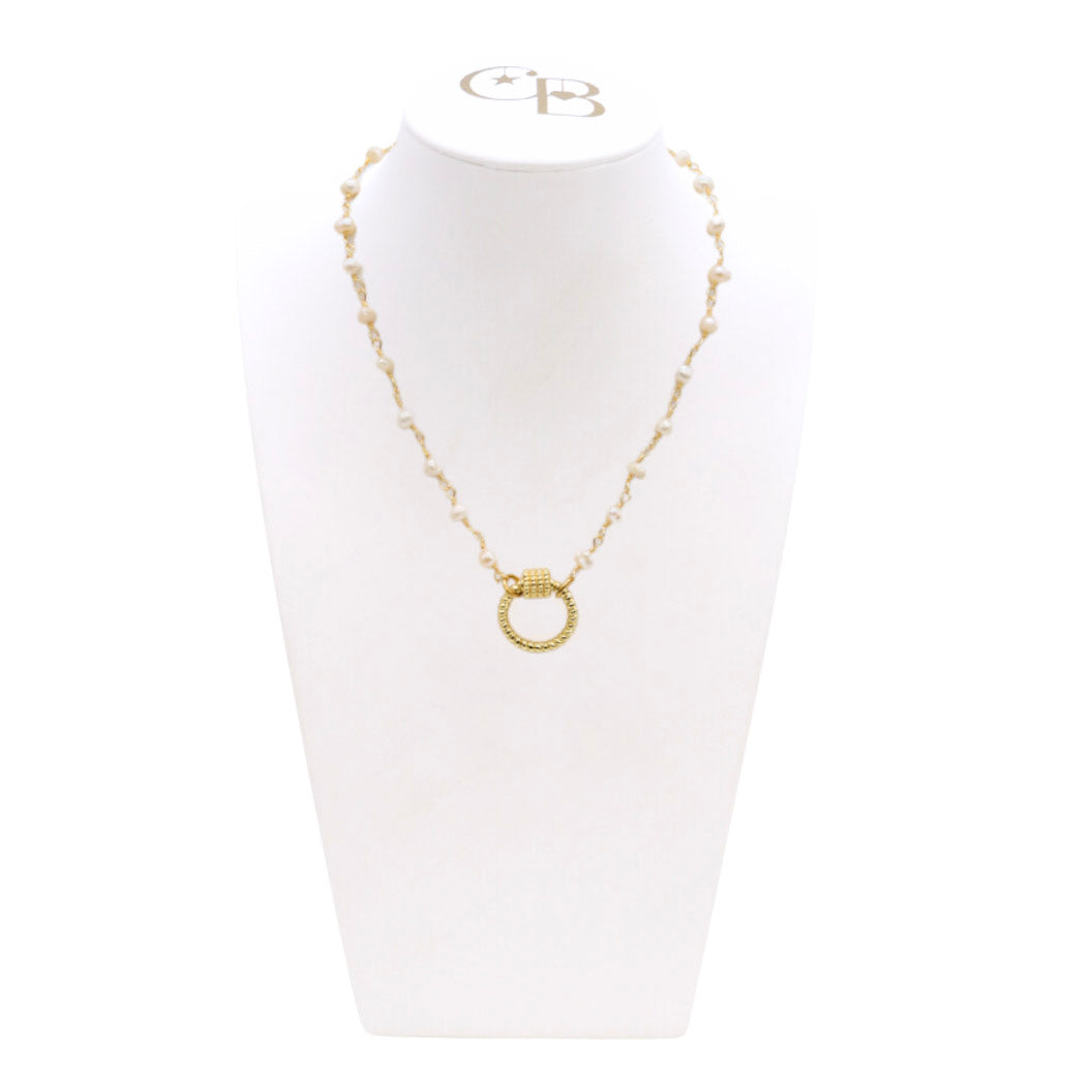 Front view of the Gold Beth Charm Necklace with Round Bella Carabiner on CB Bust
