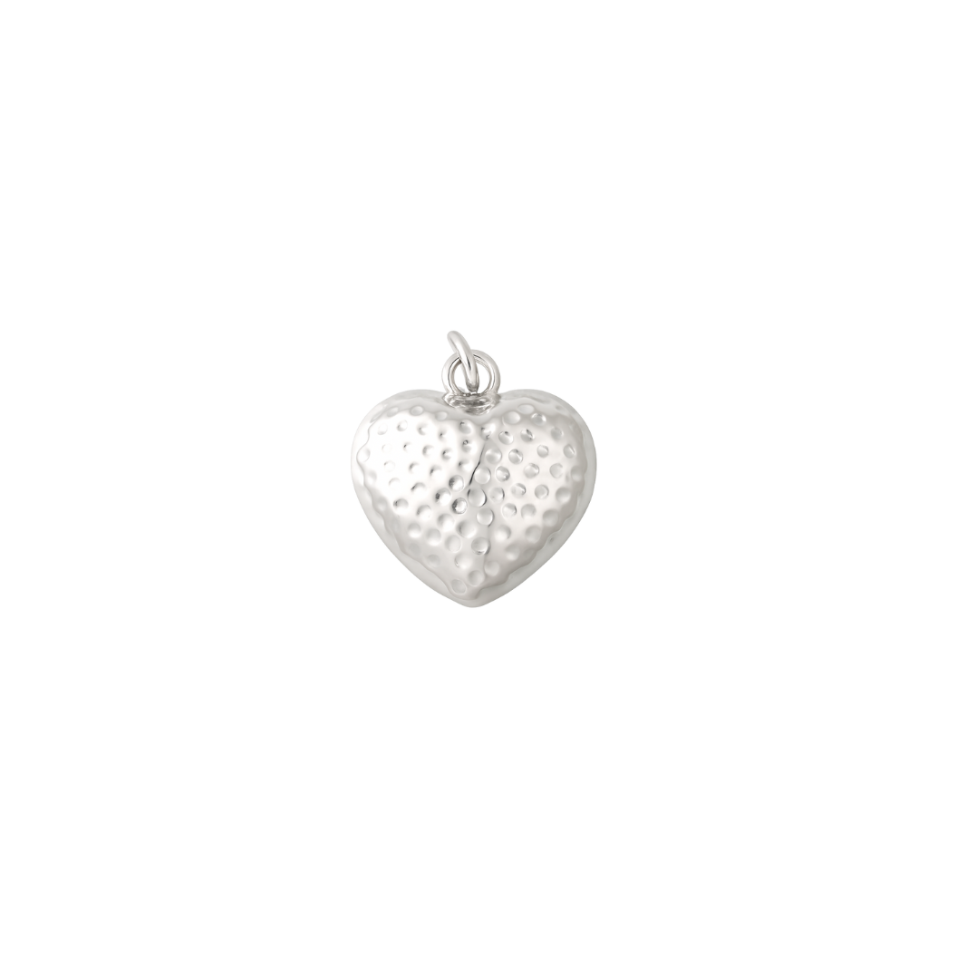 Silver heart-shaped pendant on a white background