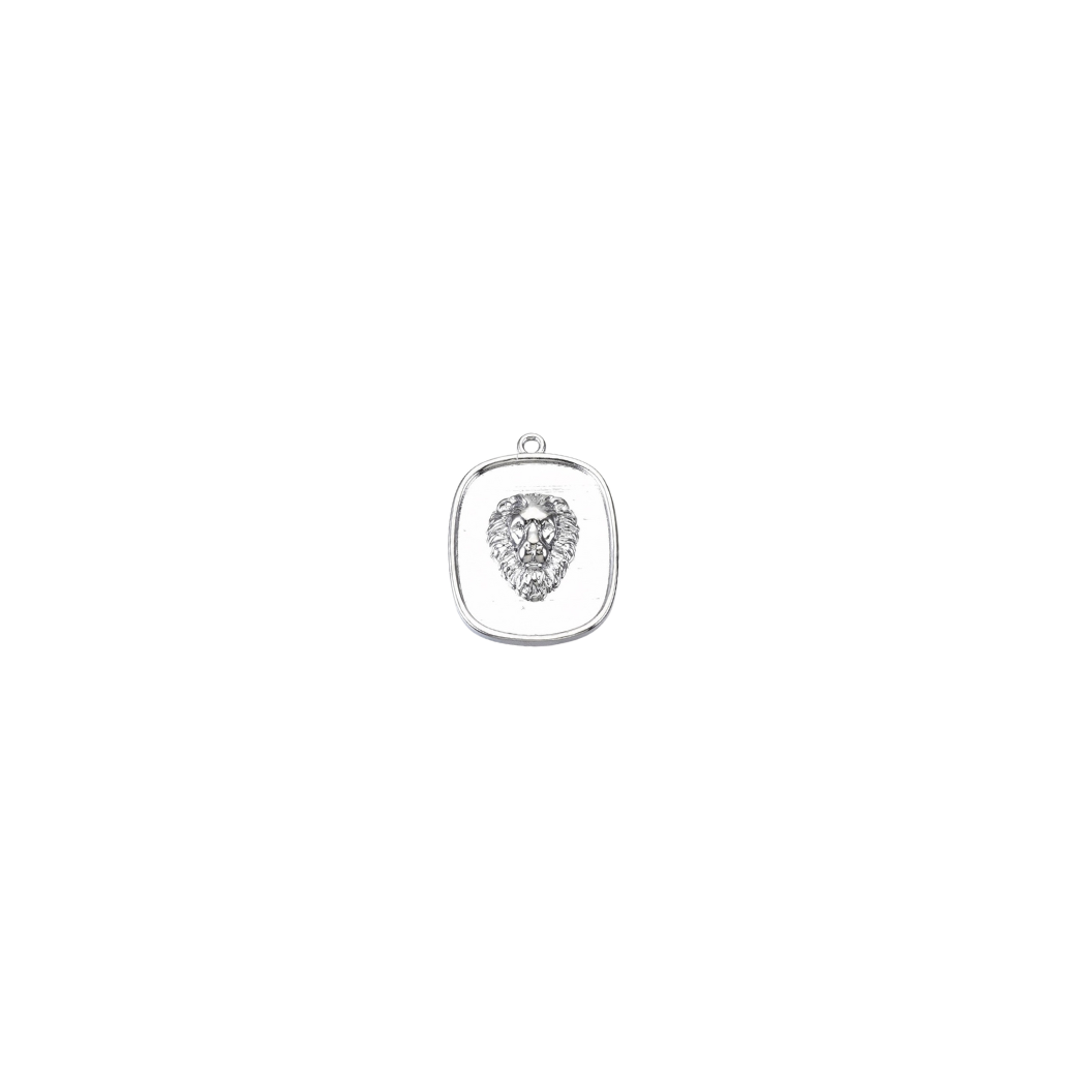 Silver pendant with a clear gemstone on a white background