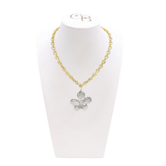 Front view of the Gold Jamesyn Necklace with Silver 5 Petal Flower Charm on CB Bust