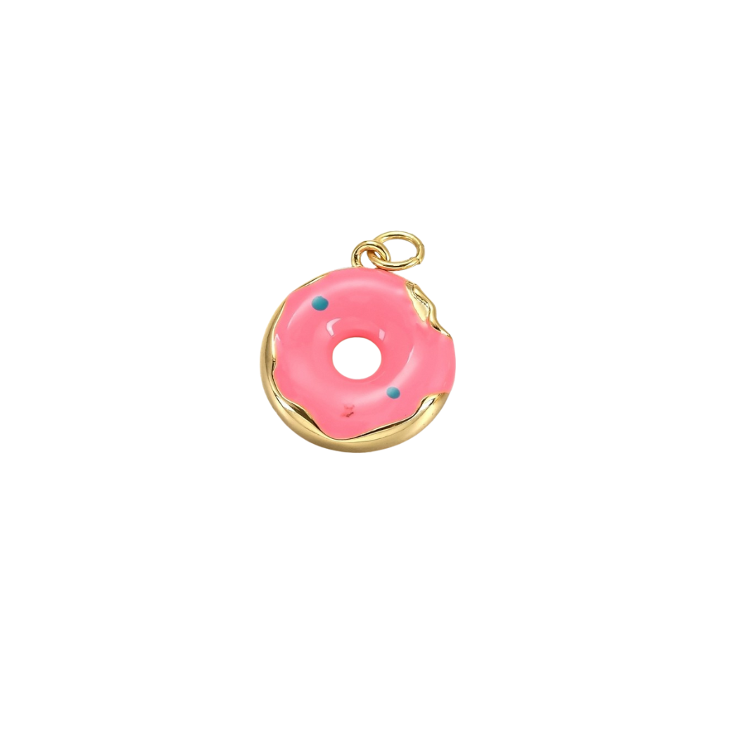 Pink donut charm with gold border on a white background