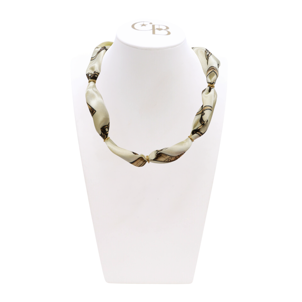 Front view of the Light Gold Bubble Scarf Necklace on CB Bust