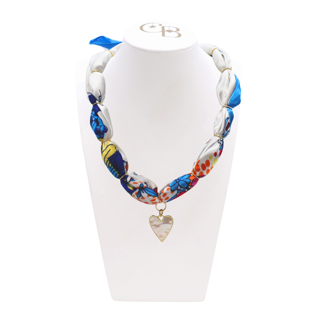 Front view of the Thick Scarf Necklace with Gold Pearlescent Statement Heart on CB Bust
