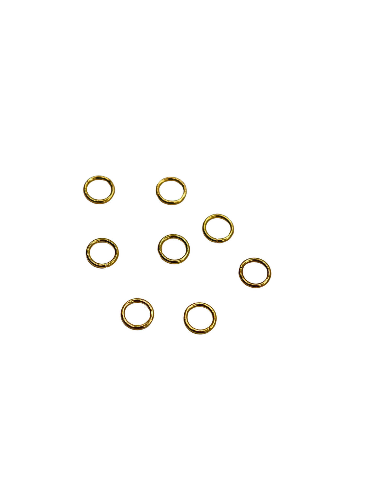 Front view of eight Gold Jump Rings