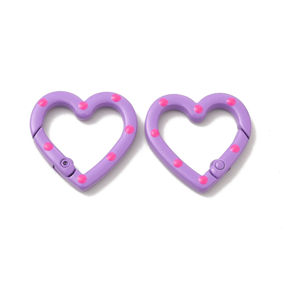 Close up front view of purple carabiners