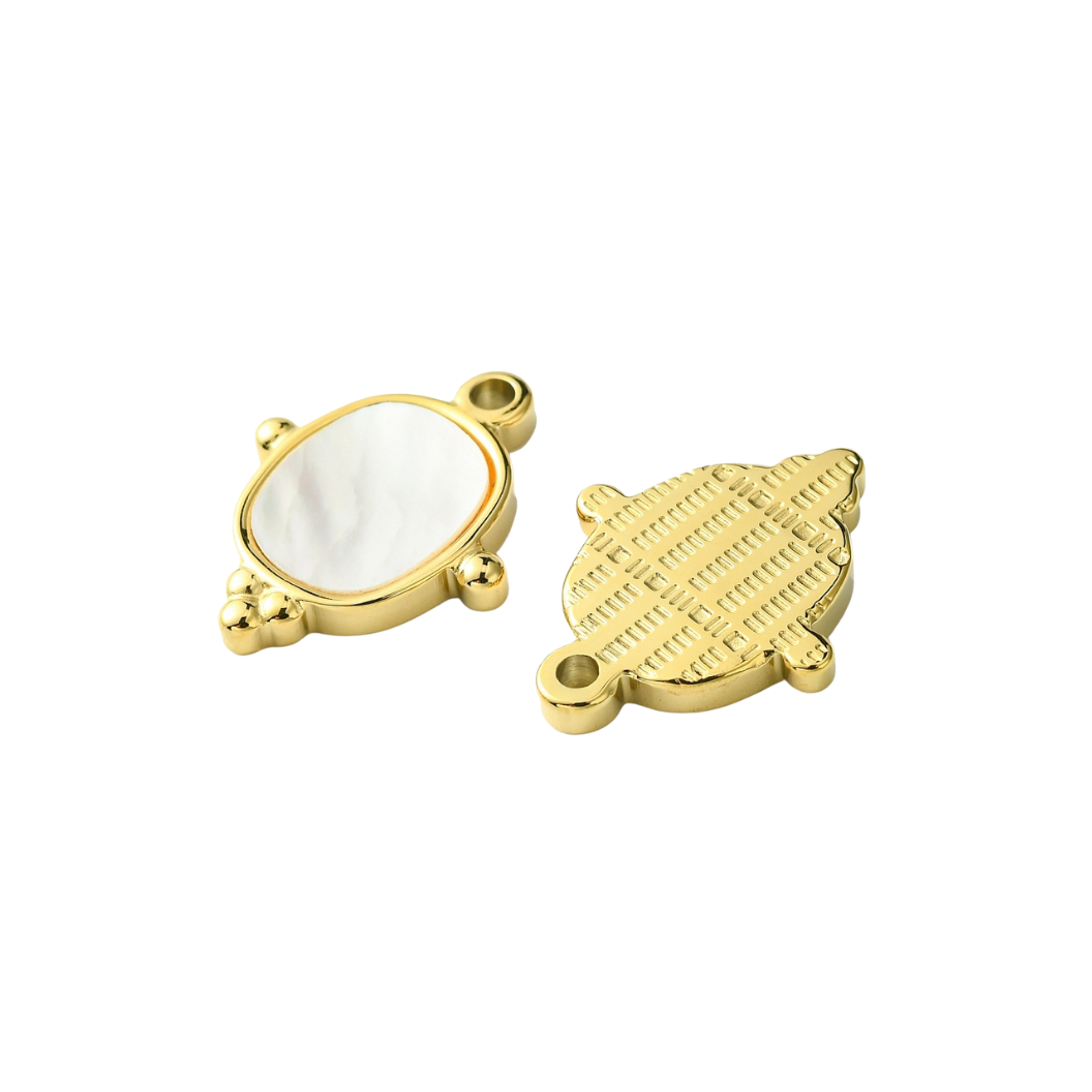 Front and back of the Gold Abalone Charm