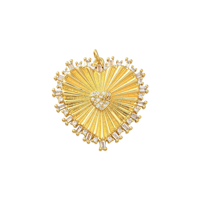 A gold-plated charm featuring a heart shape with cubic zirconia stones and a golden burst design in the center.