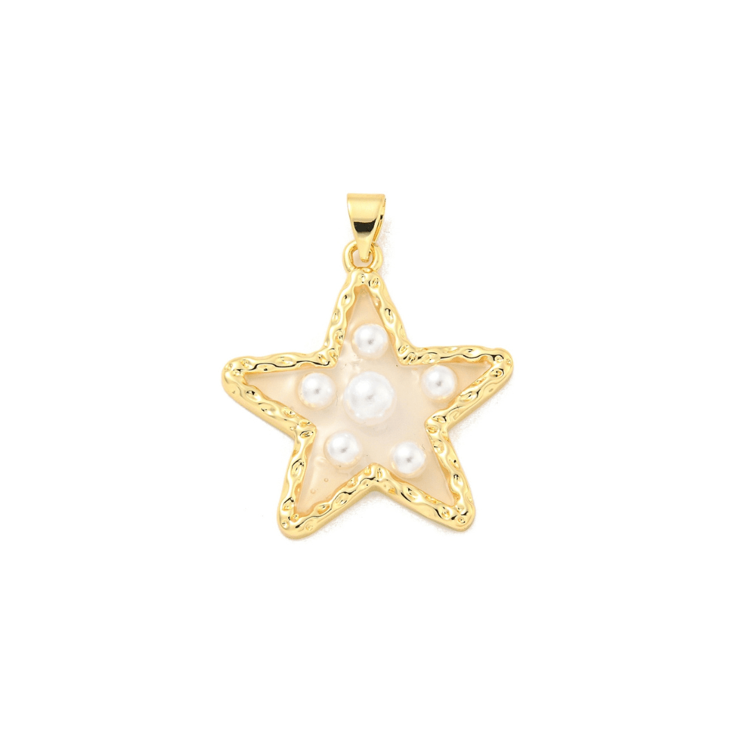 Gold star-shaped pendant with pearls on a white background