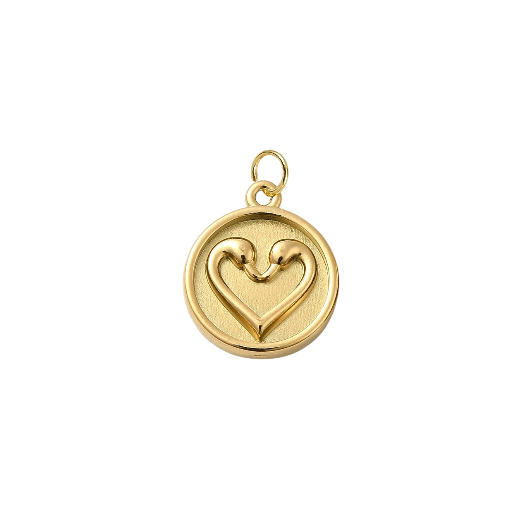 Gold pendant with a heart design on a white background