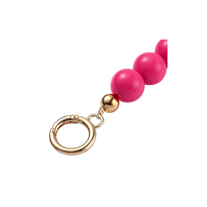 Close up view of the Gold Pink Bead Bag Extender
