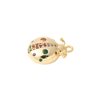 Transparent side view of the Gold Beetle with Multi Color Pave Charm