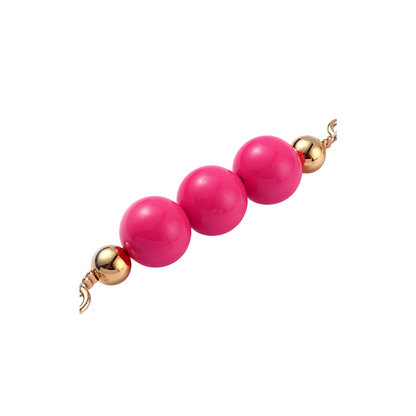 Close up view of the Gold Pink Bead Bag Extender