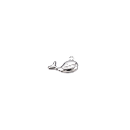 Silver whale pendant on a white background