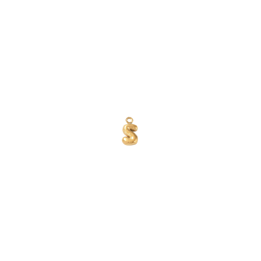 Gold 'S' pendant on a white background