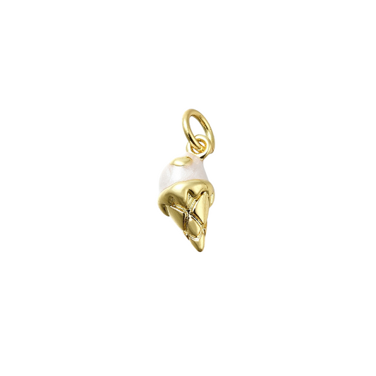 Gold and pearl charm on a white background