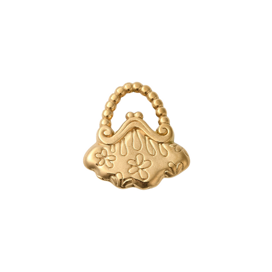 Gold ring with floral designs on a white background