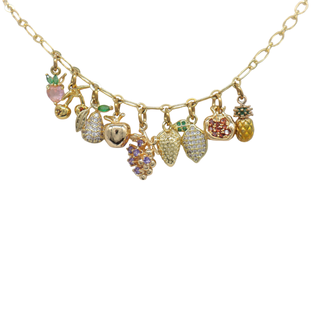 Necklace with various fruit-shaped charms on a white background