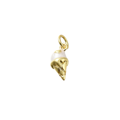 Gold and pearl charm on a white background