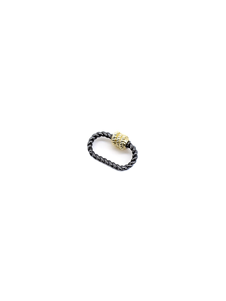 Micro Bella black and gold oval twist carabiner on white background.