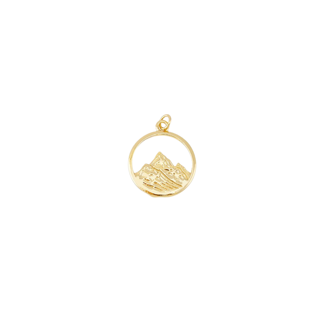 Gold pendant with mountain design on a white background