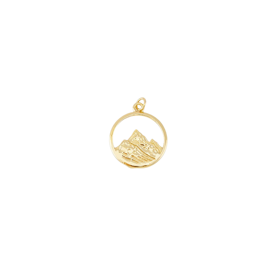 Gold pendant with mountain design on a white background