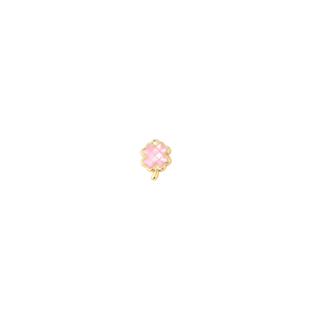 Small pink flower-shaped charm on a white background