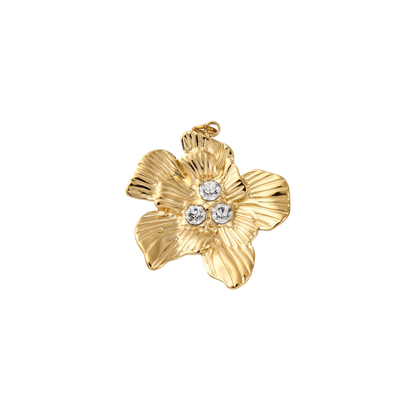 Gold pendant with three clear stones on a white background