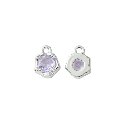 Front and back view of the Silver Lavender Glow Charm
