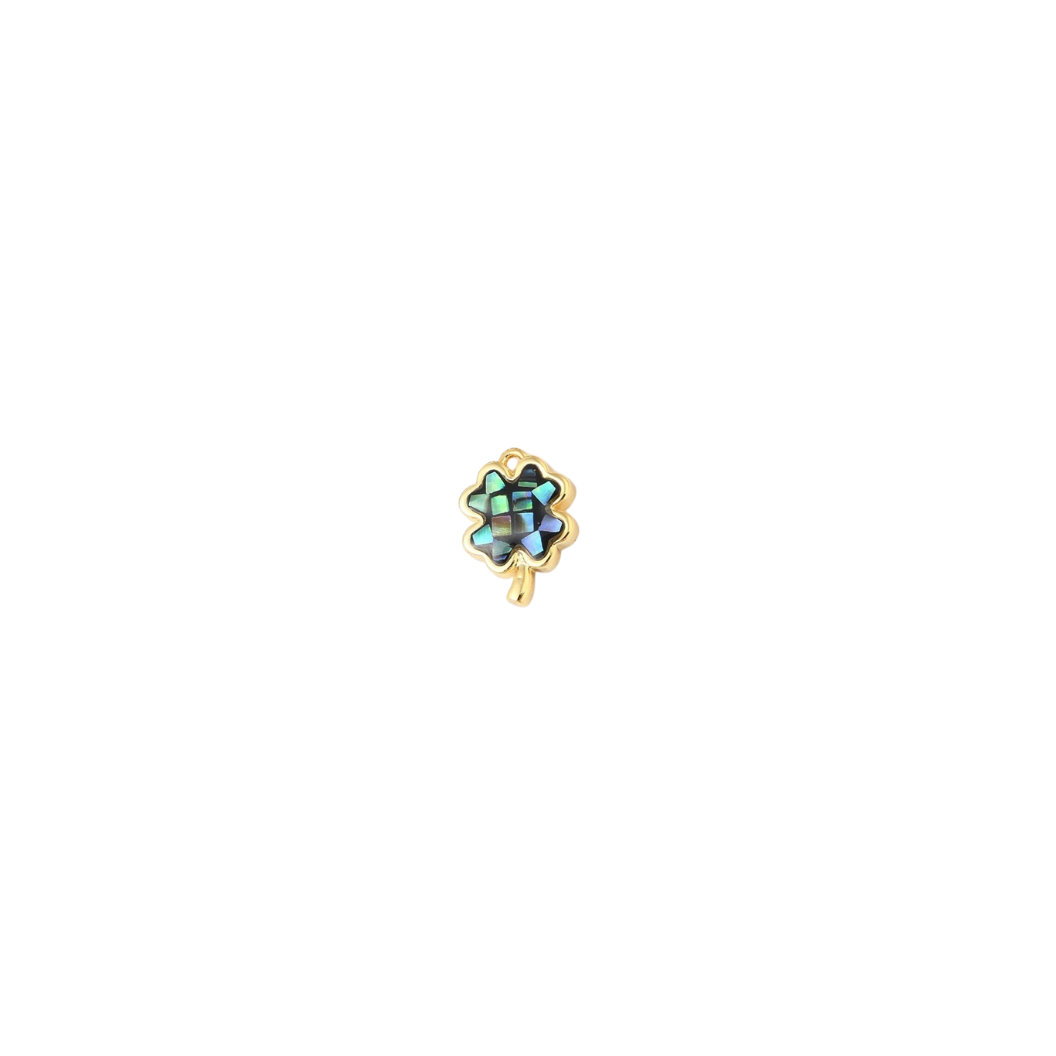 Gold earring with a multicolored gemstone on a white background