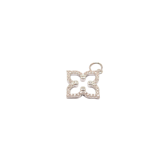 Silver butterfly-shaped charm on a white background