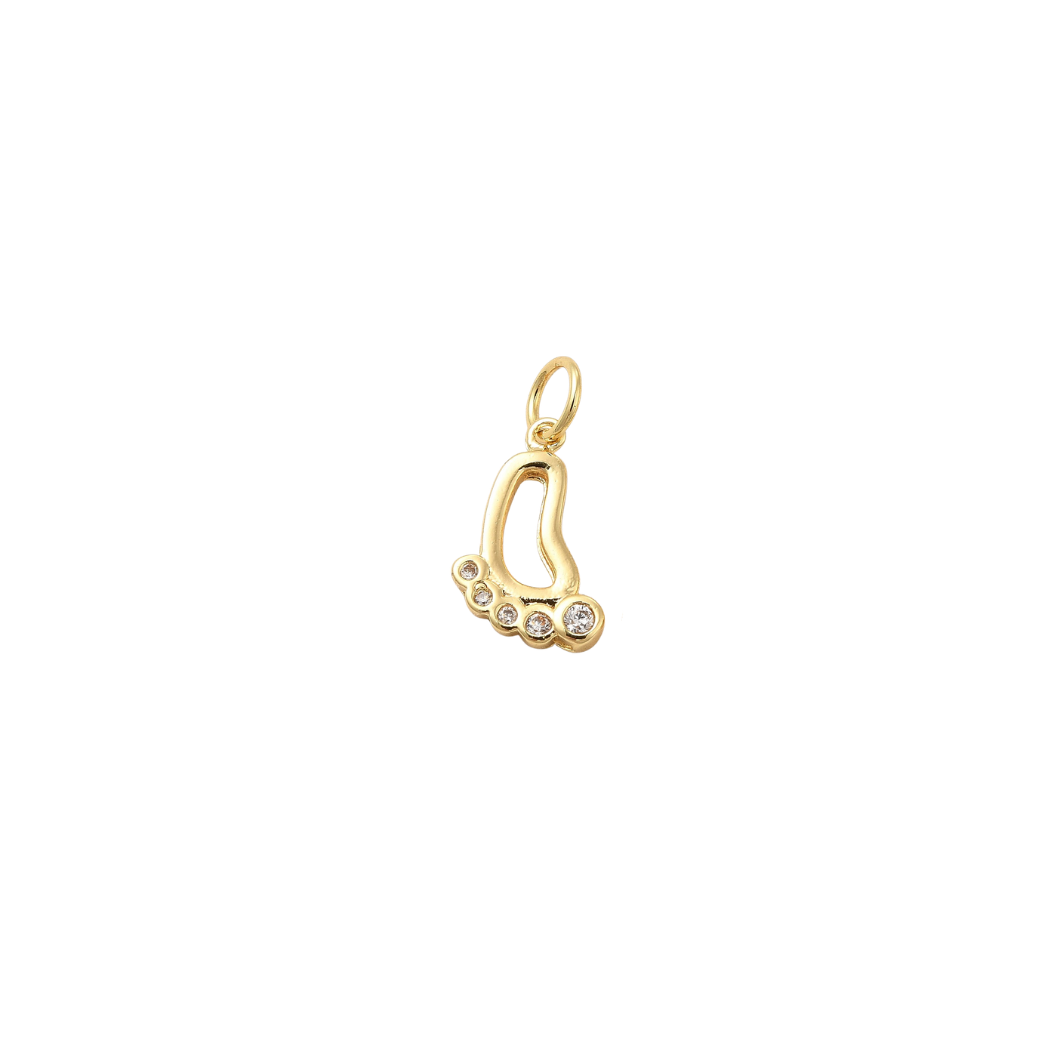 Gold pendant with a heart design on a white background