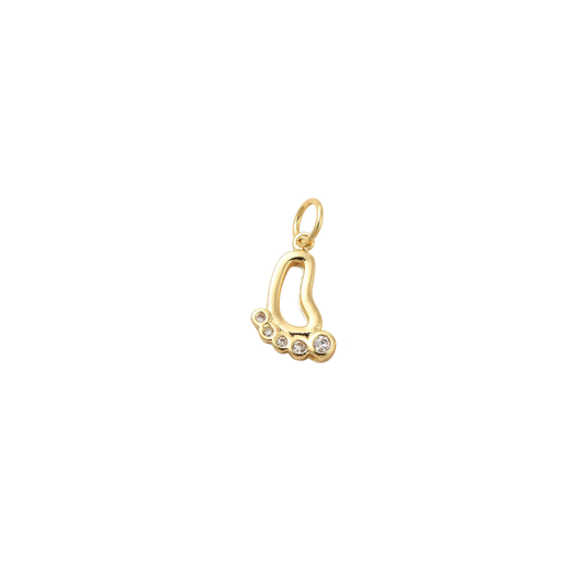Gold pendant with a heart design on a white background