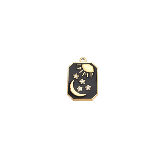 Black and gold pendant with moon and star design on a white background