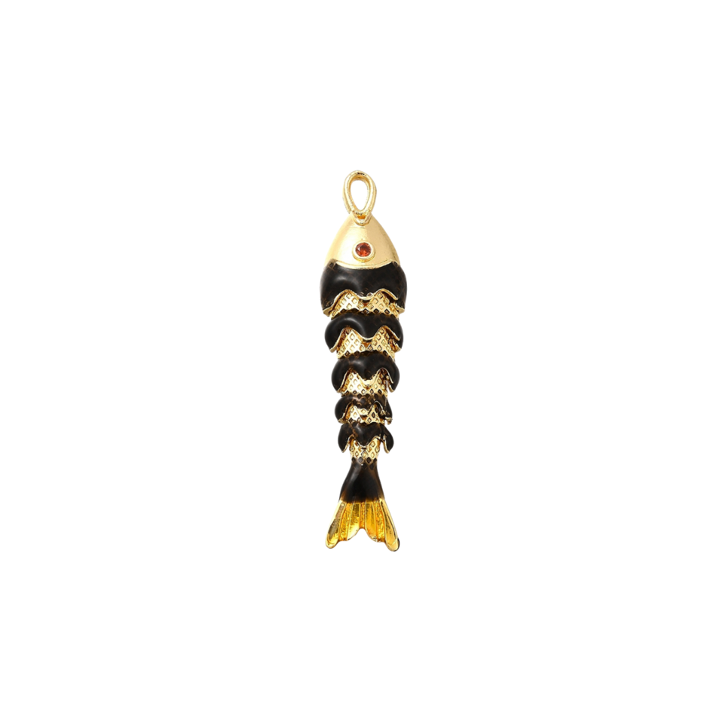 Gold and black fish-shaped pendant on a white background