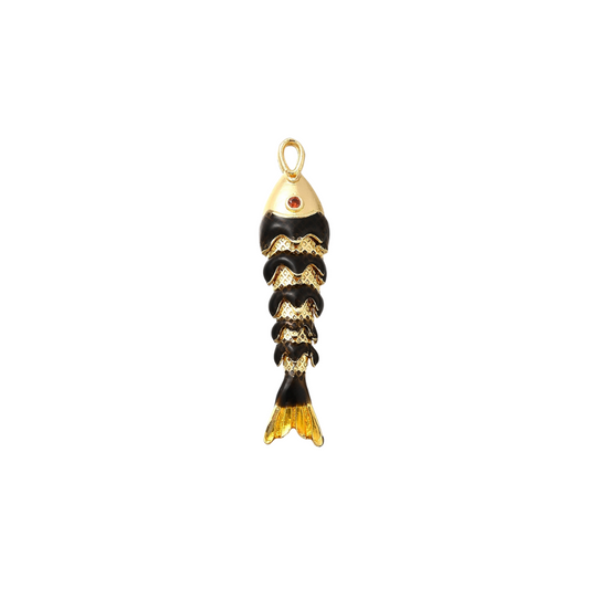 Gold and black fish-shaped pendant on a white background