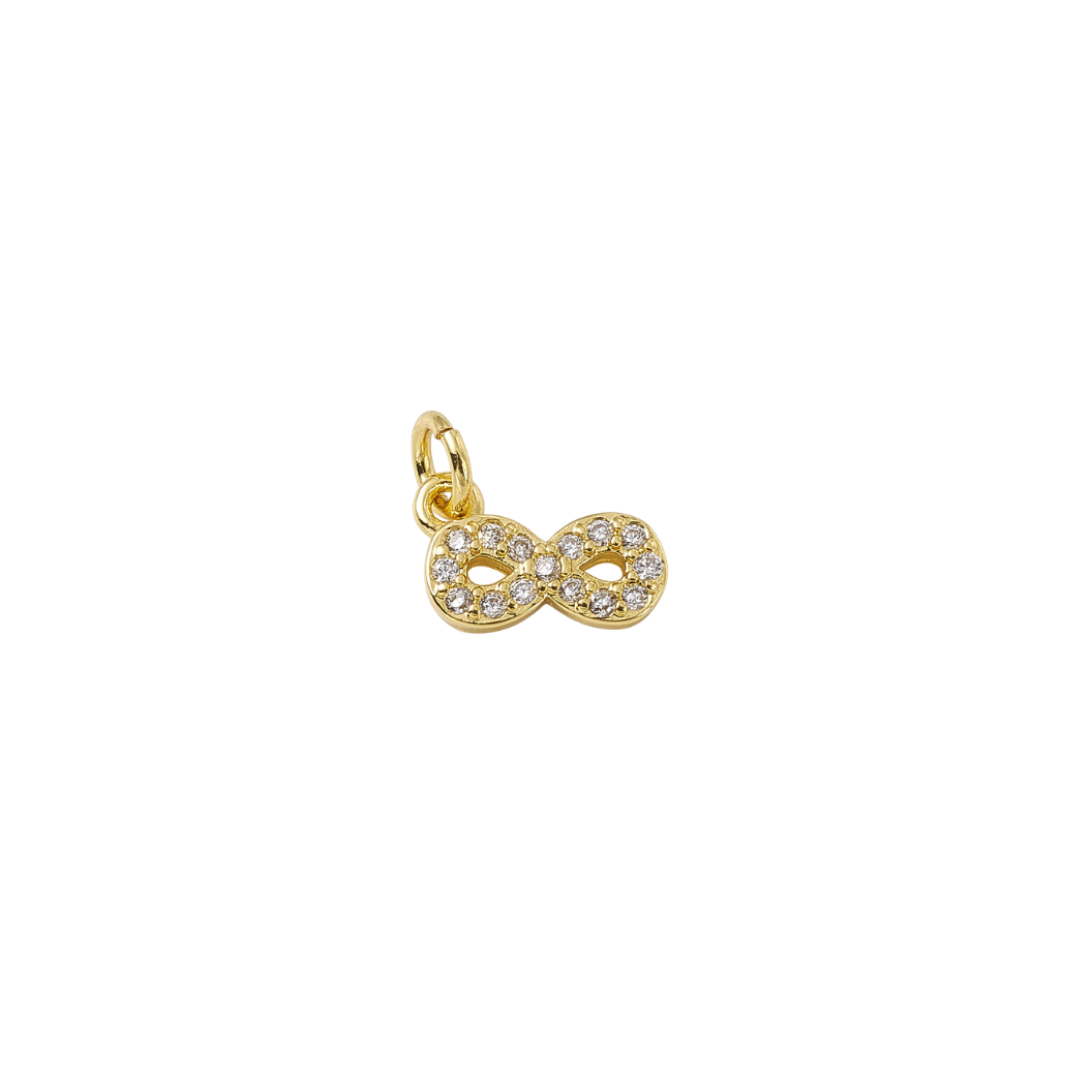 Gold letter 'S' charm on a white background