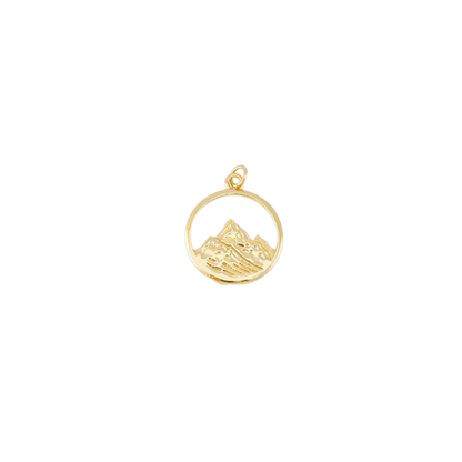 Gold pendant with mountain design on a white background