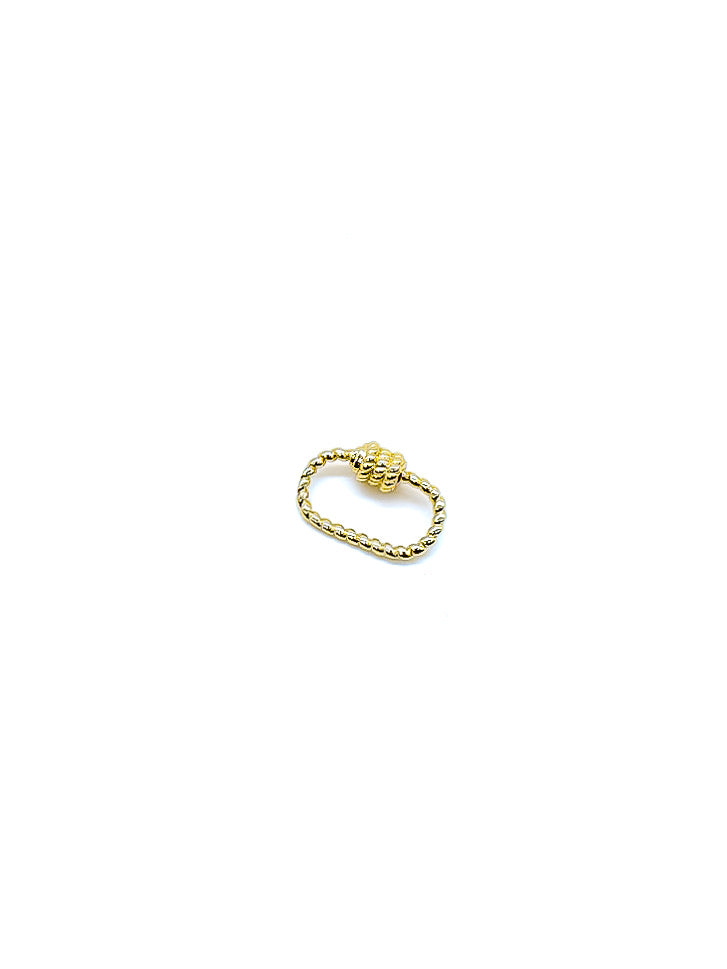 Micro Bella gold oval twist carabiner on white background.