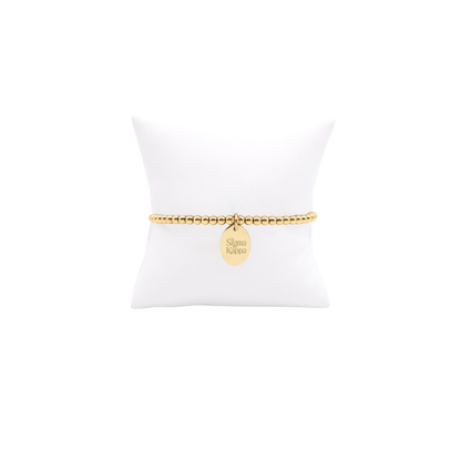 Sigma Kappa Classic Gold Beaded Bracelet with Small Gold Oval Charm | Waterproof, Hypoallergenic & Tarnish Resistant