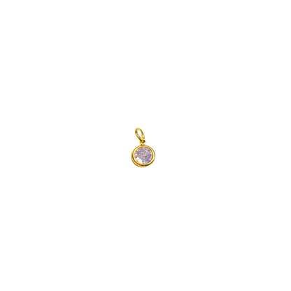 Gold pendant with a clear gemstone on a white background