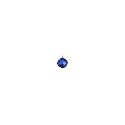 Blue gemstone pendant on a white background
