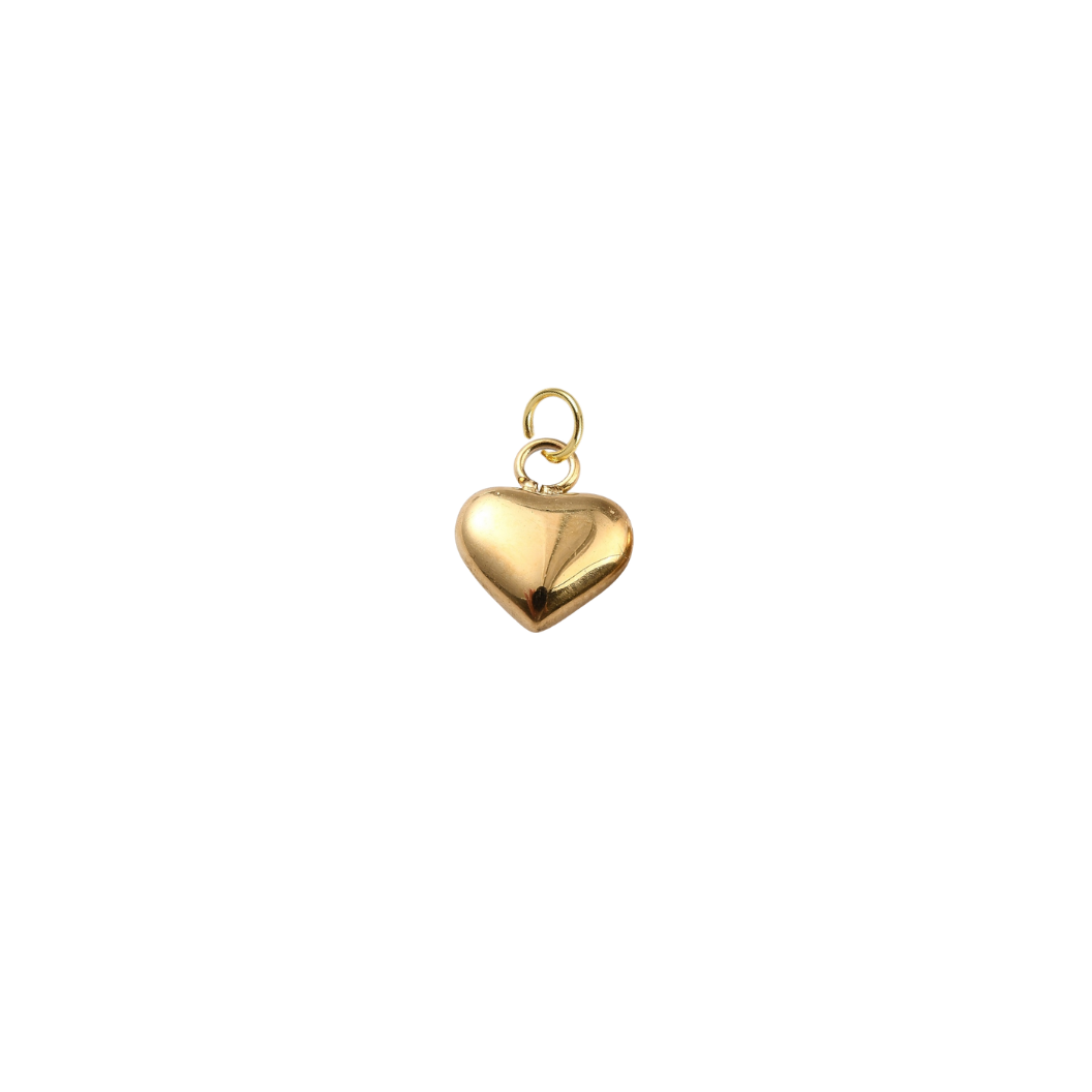 Gold heart-shaped pendant on a white background